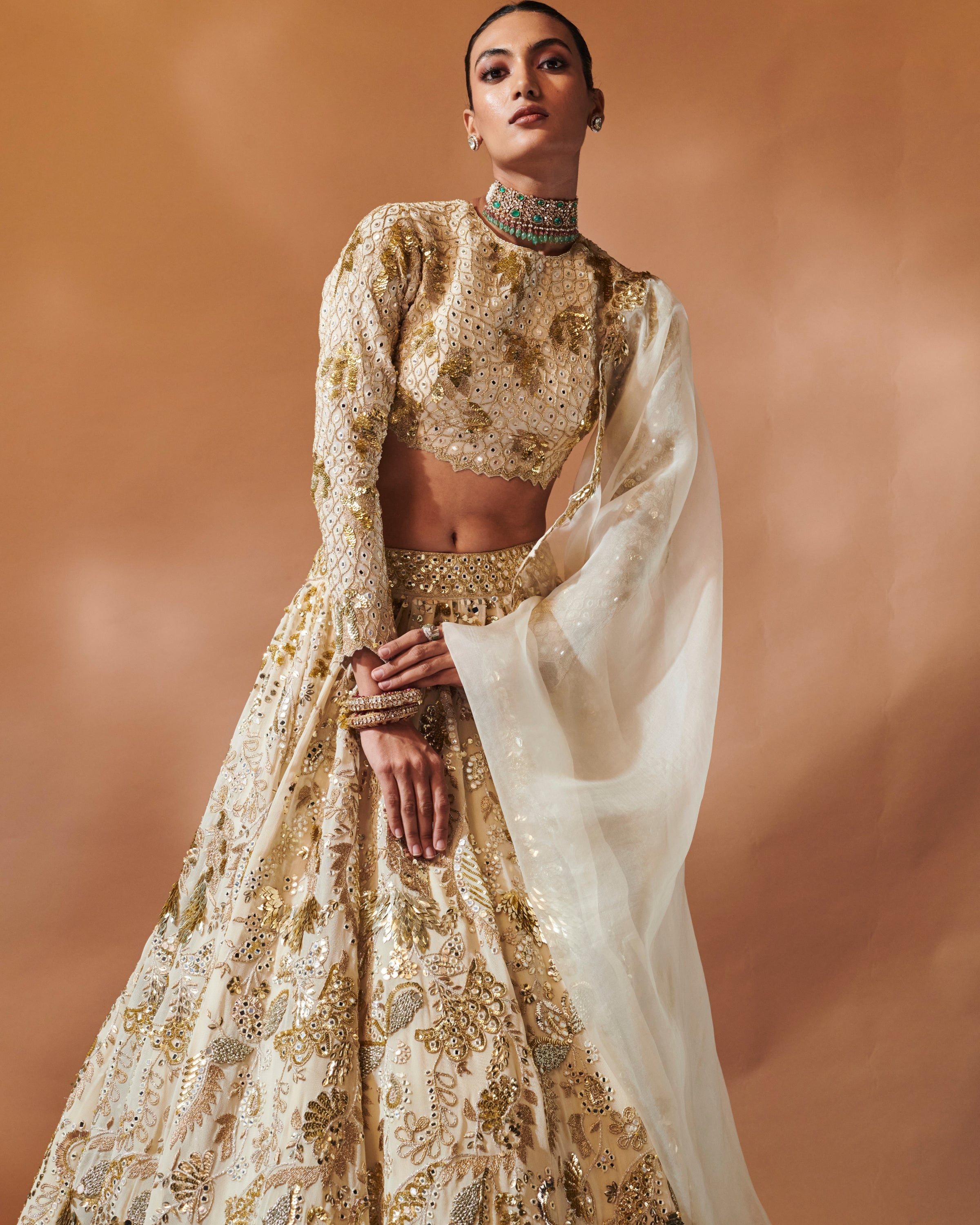 Azra Ivory And Gold Heavily Embroidered Lehenga Set