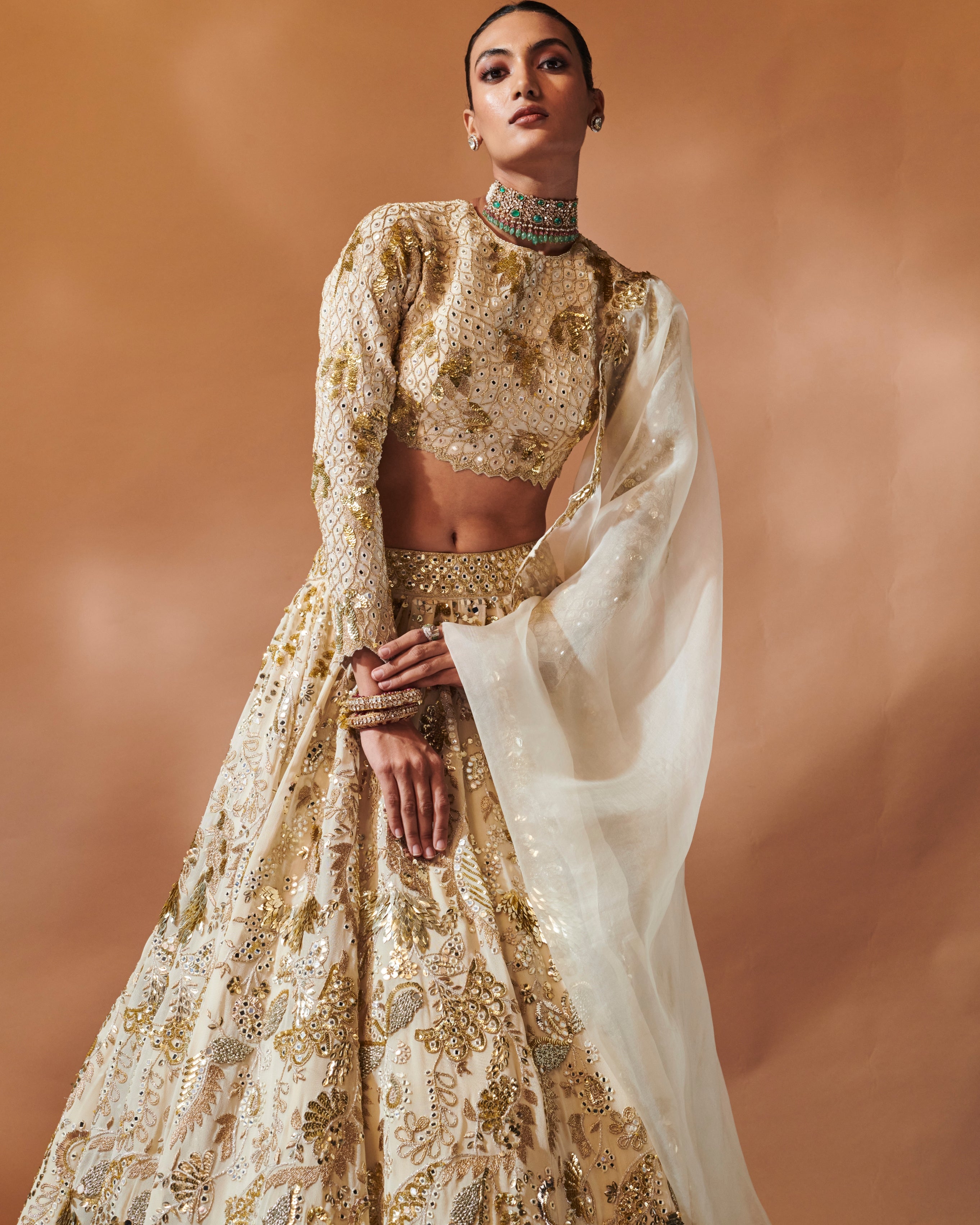 Azra Ivory And Gold Heavily Embroidered Lehenga Set