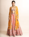 Old Rose Lehenga Set With Contrast Triangle Cape by Nupur Kanoi