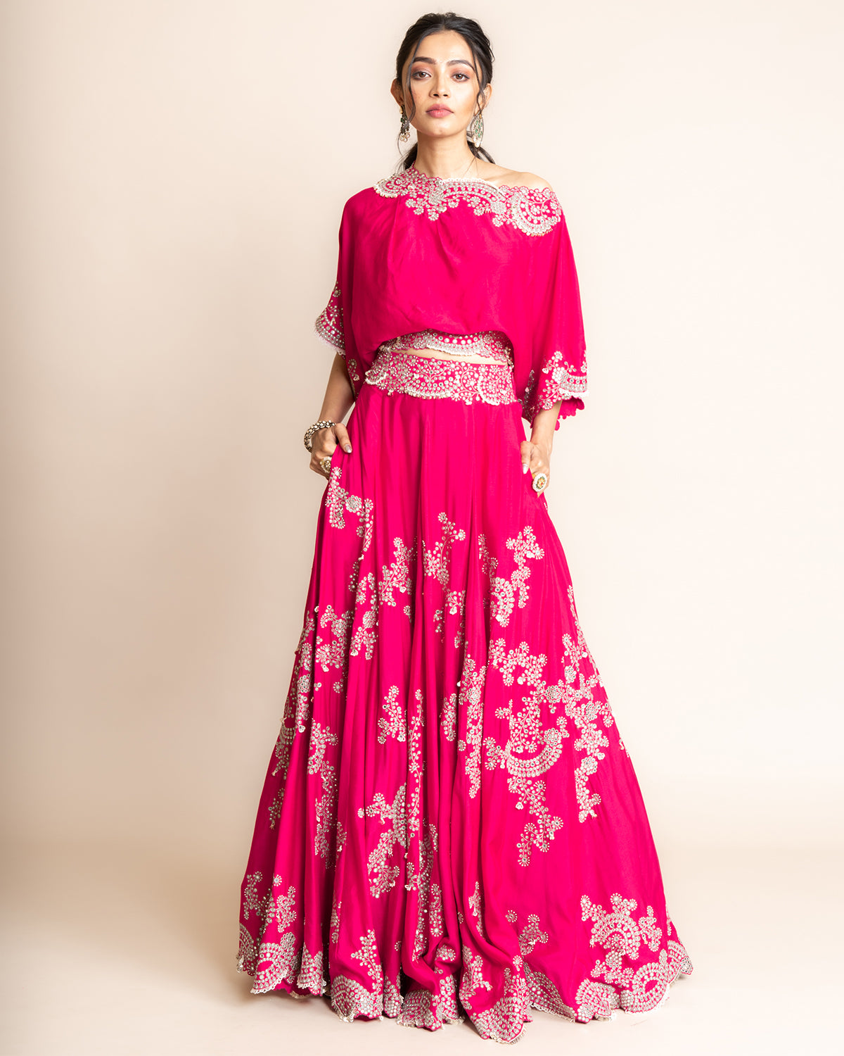 Fuchsia Hand Embroidered Off-Shoulder Top With Lehenga by Nupur Kanoi