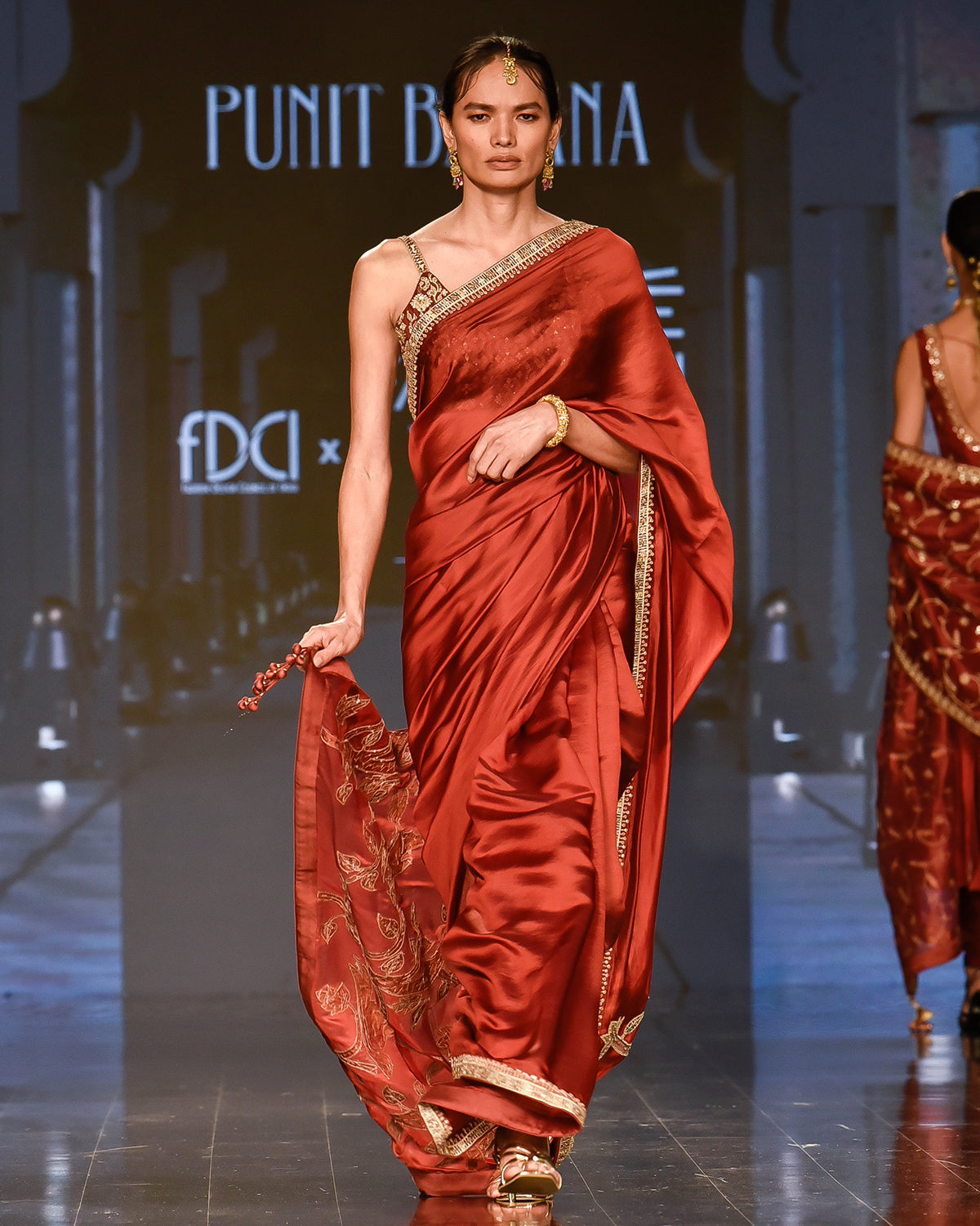 Brick Red Embroidered Sari With Strappy Blouse