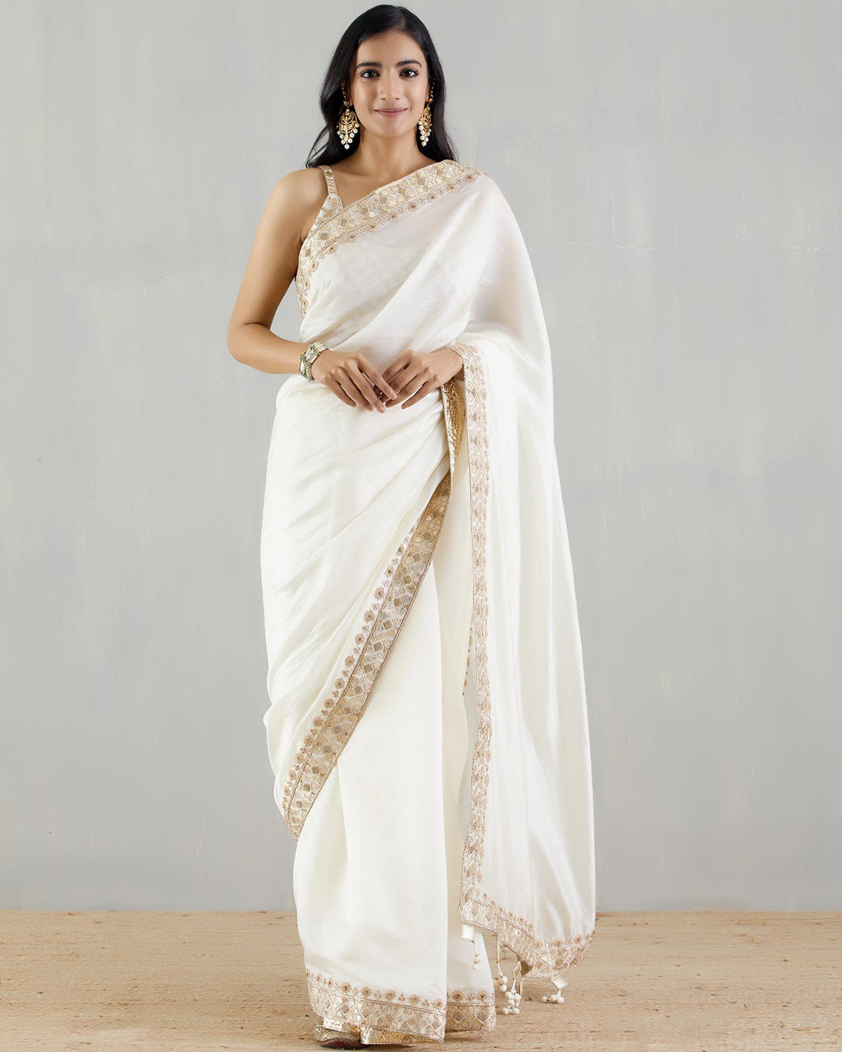 Ivory Organza Silk Sari With Heavy Blouse by Punit Balana