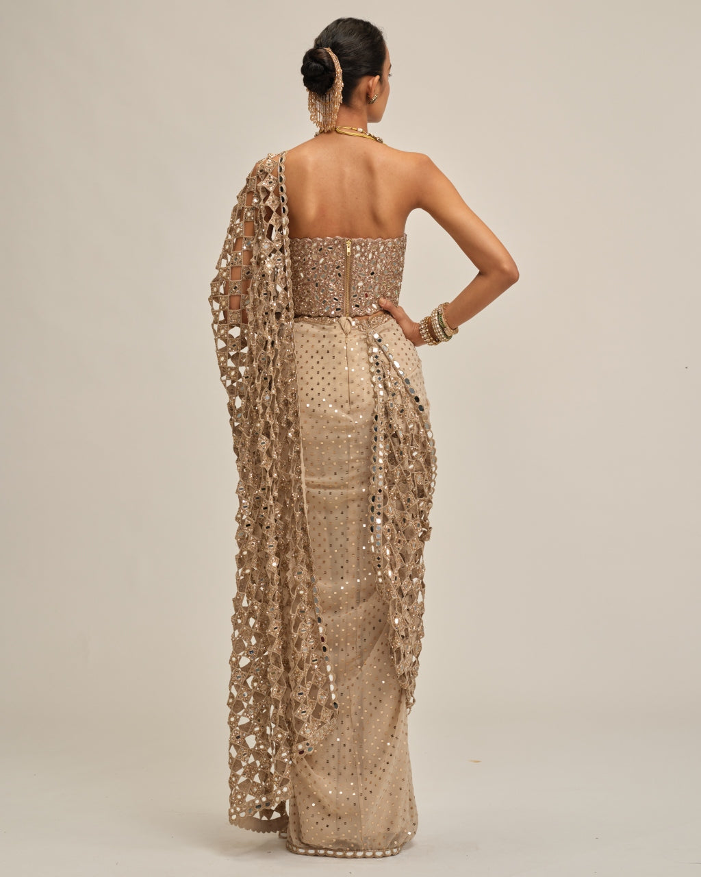 Light Beige Cutwork Pallu Sari With Corset Set