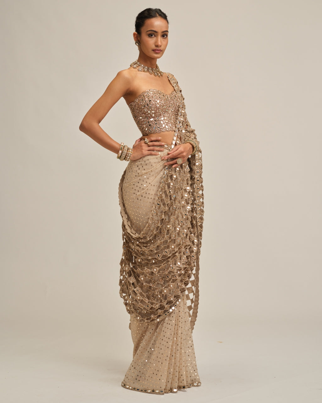 Light Beige Cutwork Pallu Sari With Corset Set