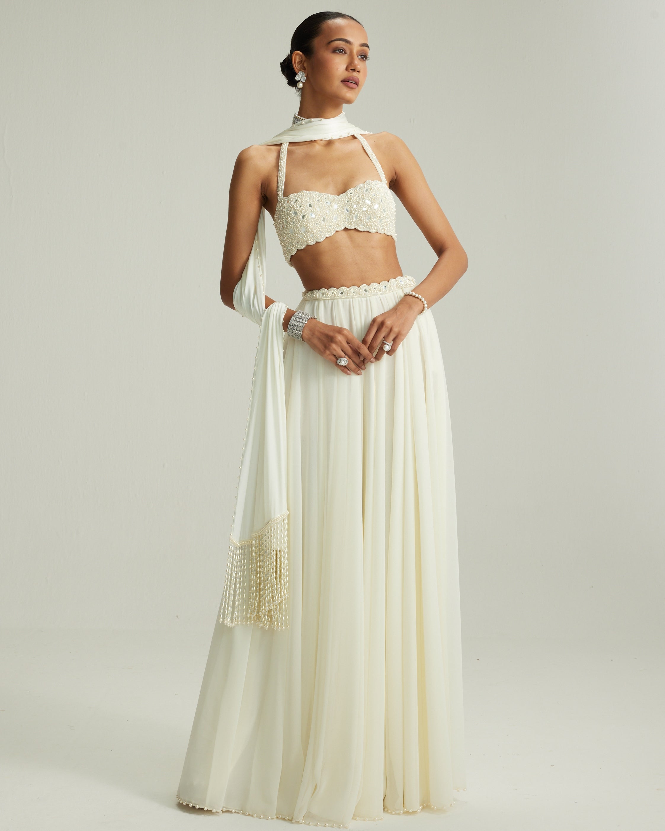 Off White Skirt Set With Halter Neck Blouse