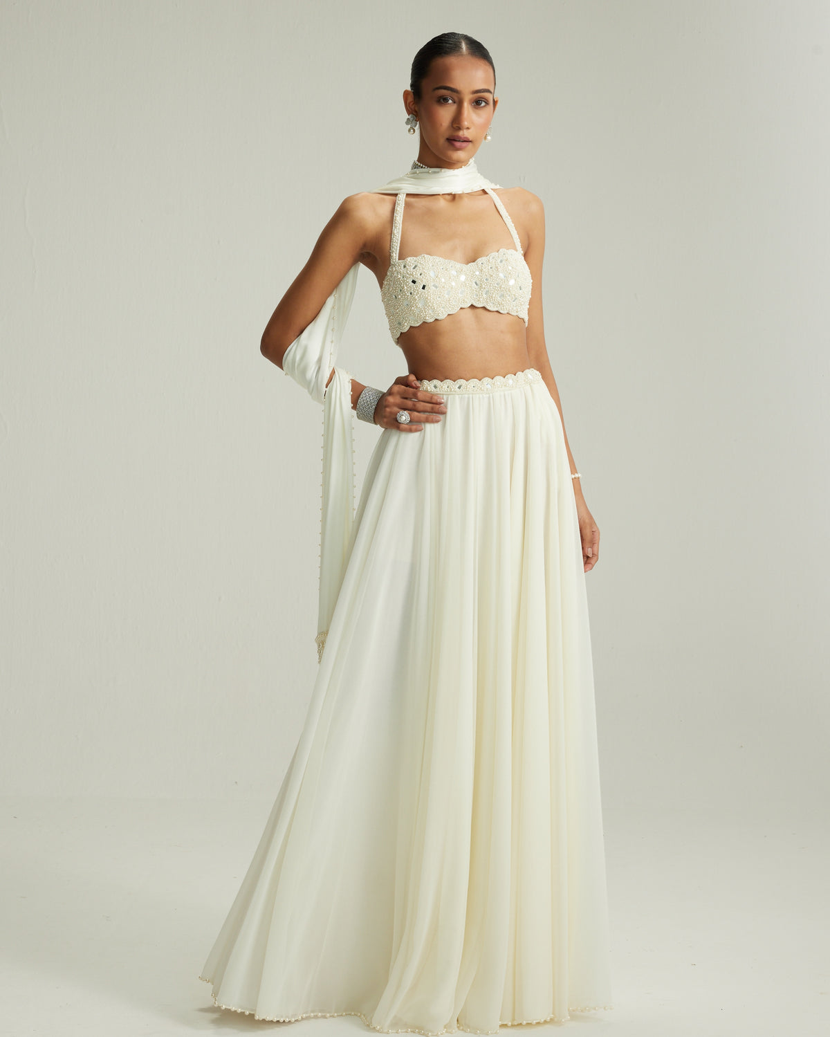 Off White Skirt Set With Halter Neck Blouse