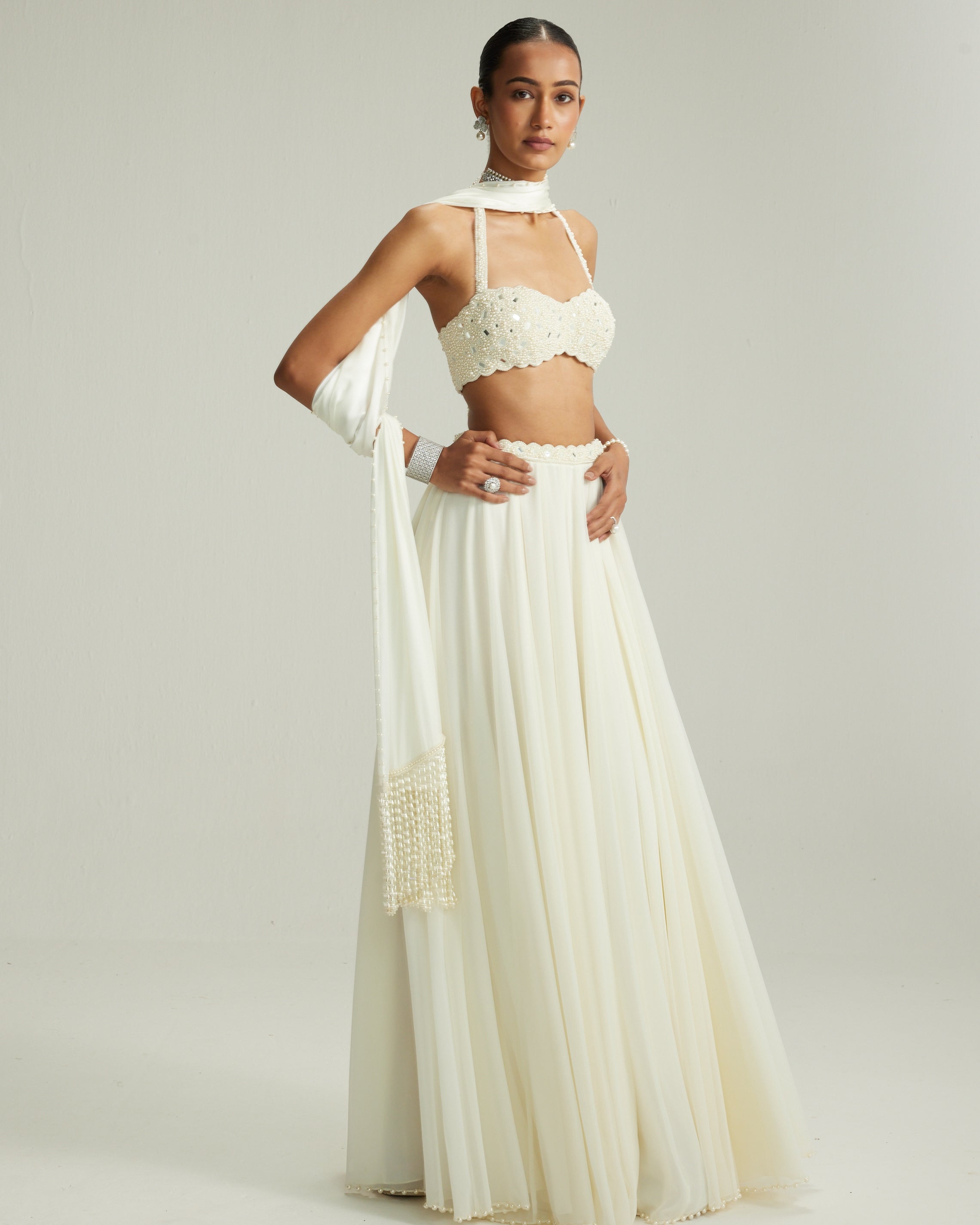 Off White Skirt Set With Halter Neck Blouse