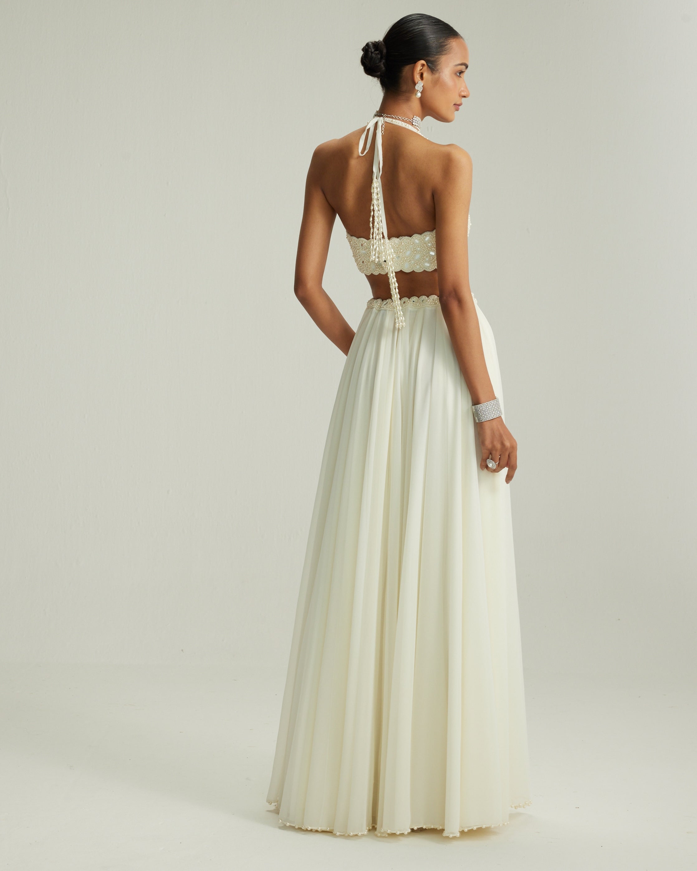 Off White Skirt Set With Halter Neck Blouse