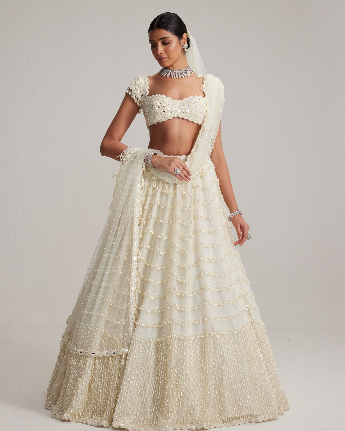 Off White Mirror And Pearl Drop Bridal Lehenga Set