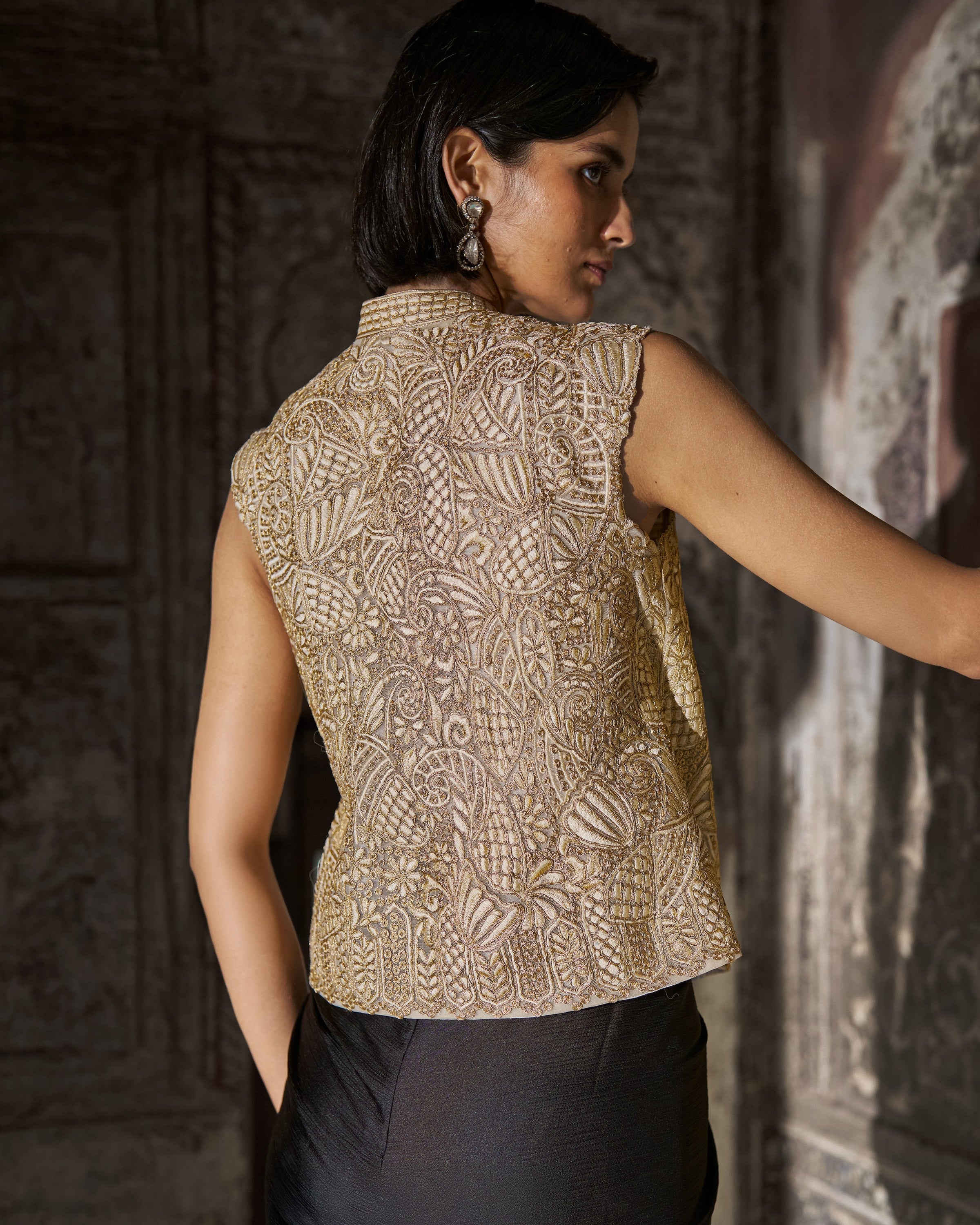 Embroidered Sleeveless Top and Black Draped Skirt