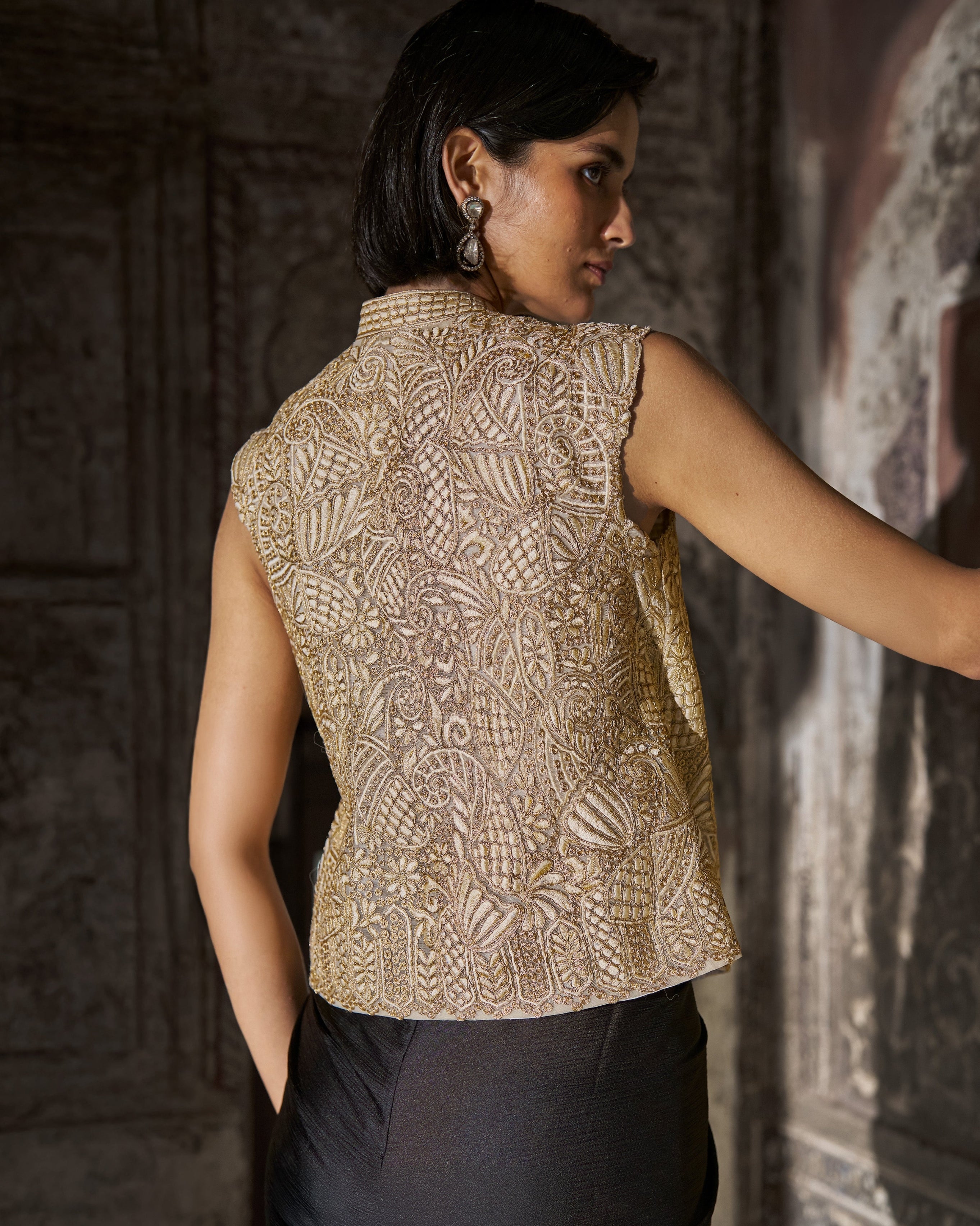 Embroidered Sleeveless Top and Black Draped Skirt