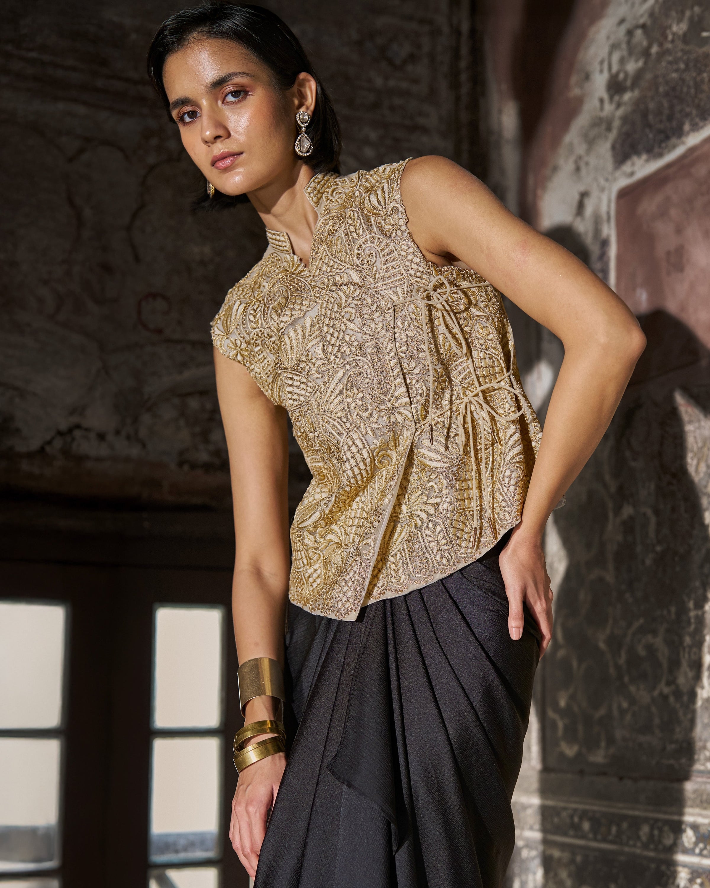 Embroidered Sleeveless Top and Black Draped Skirt