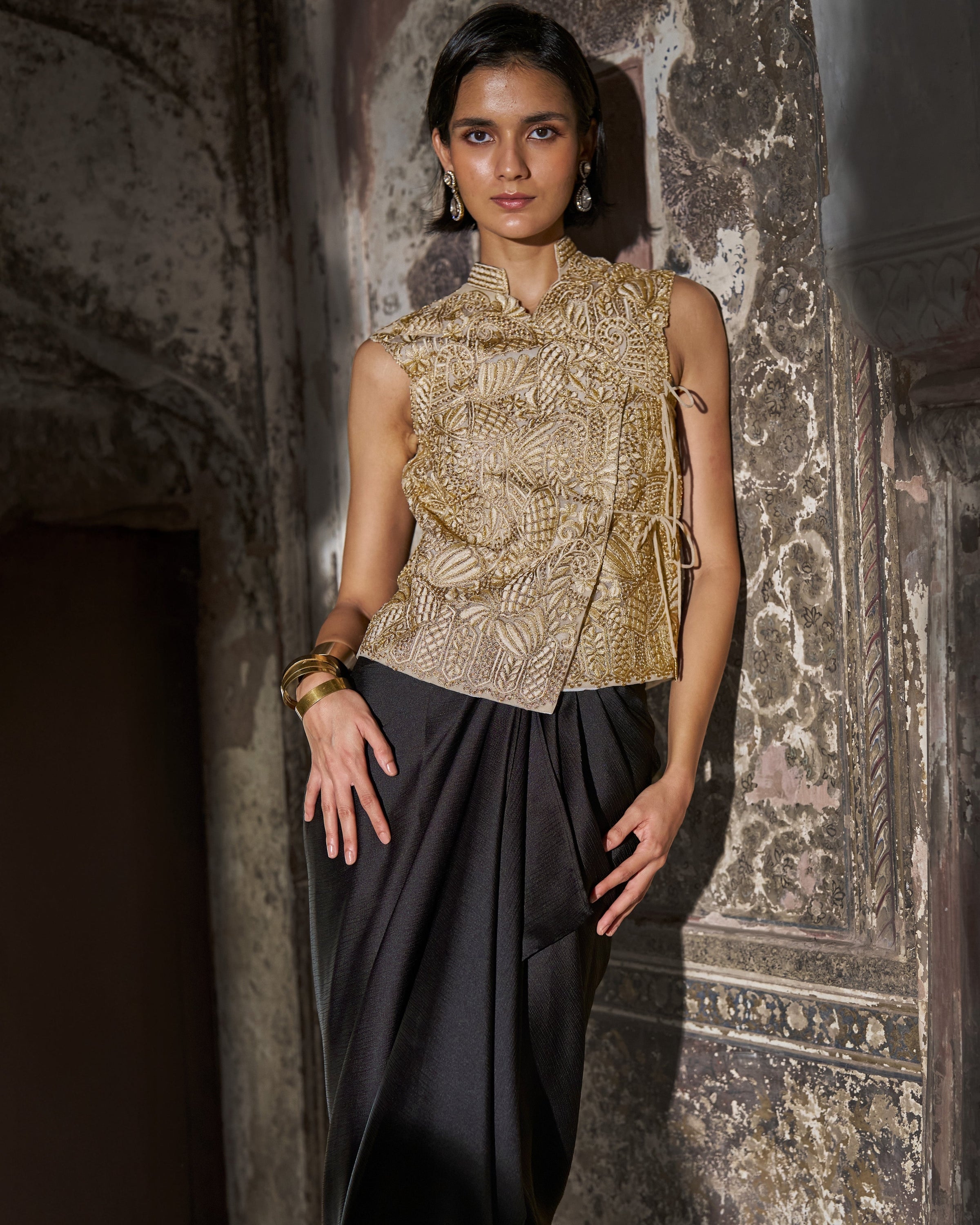 Embroidered Sleeveless Top and Black Draped Skirt