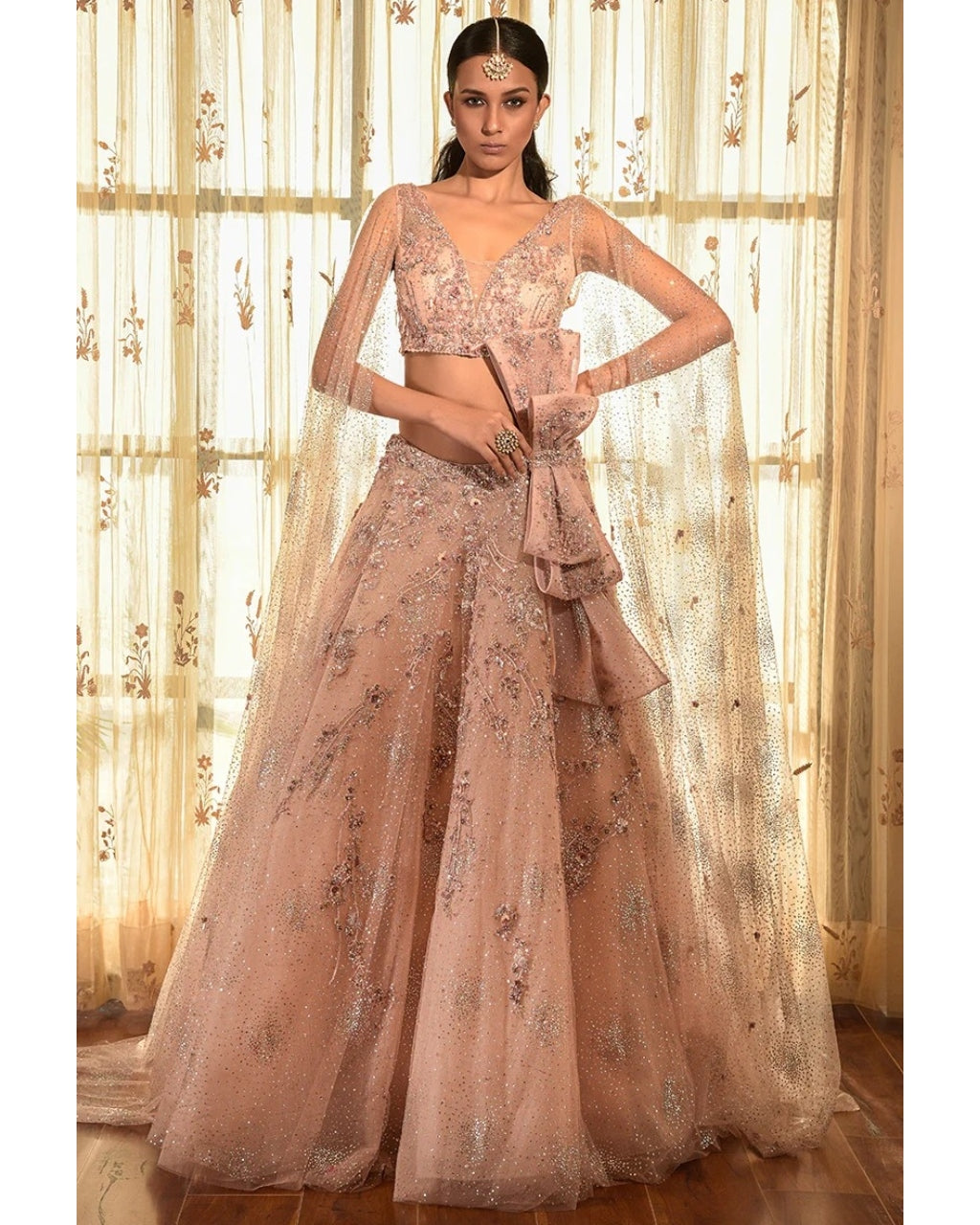 Sea Shell Tulle Lehenga Set With Extended Sleeves.