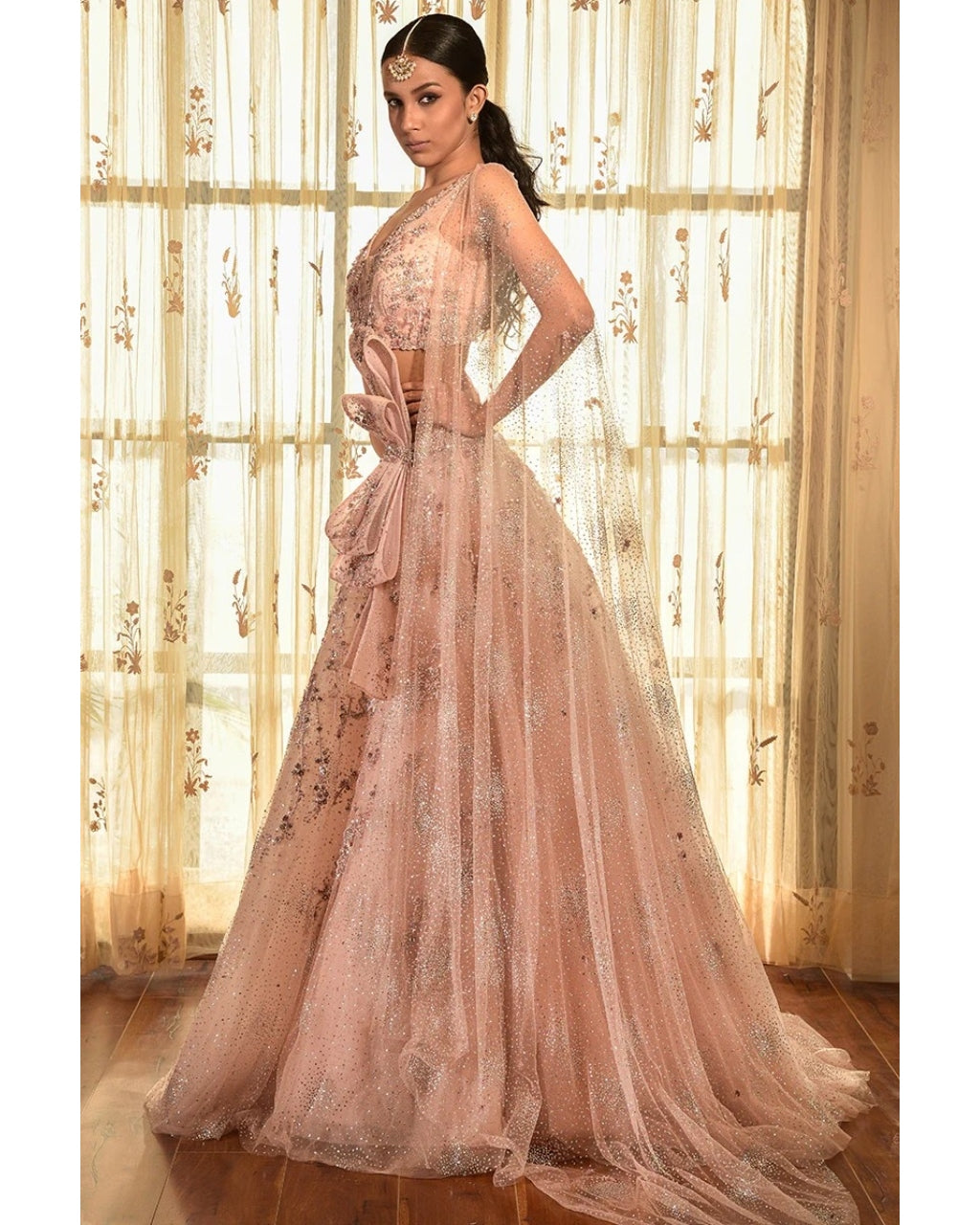 Sea Shell Tulle Lehenga Set With Extended Sleeves.