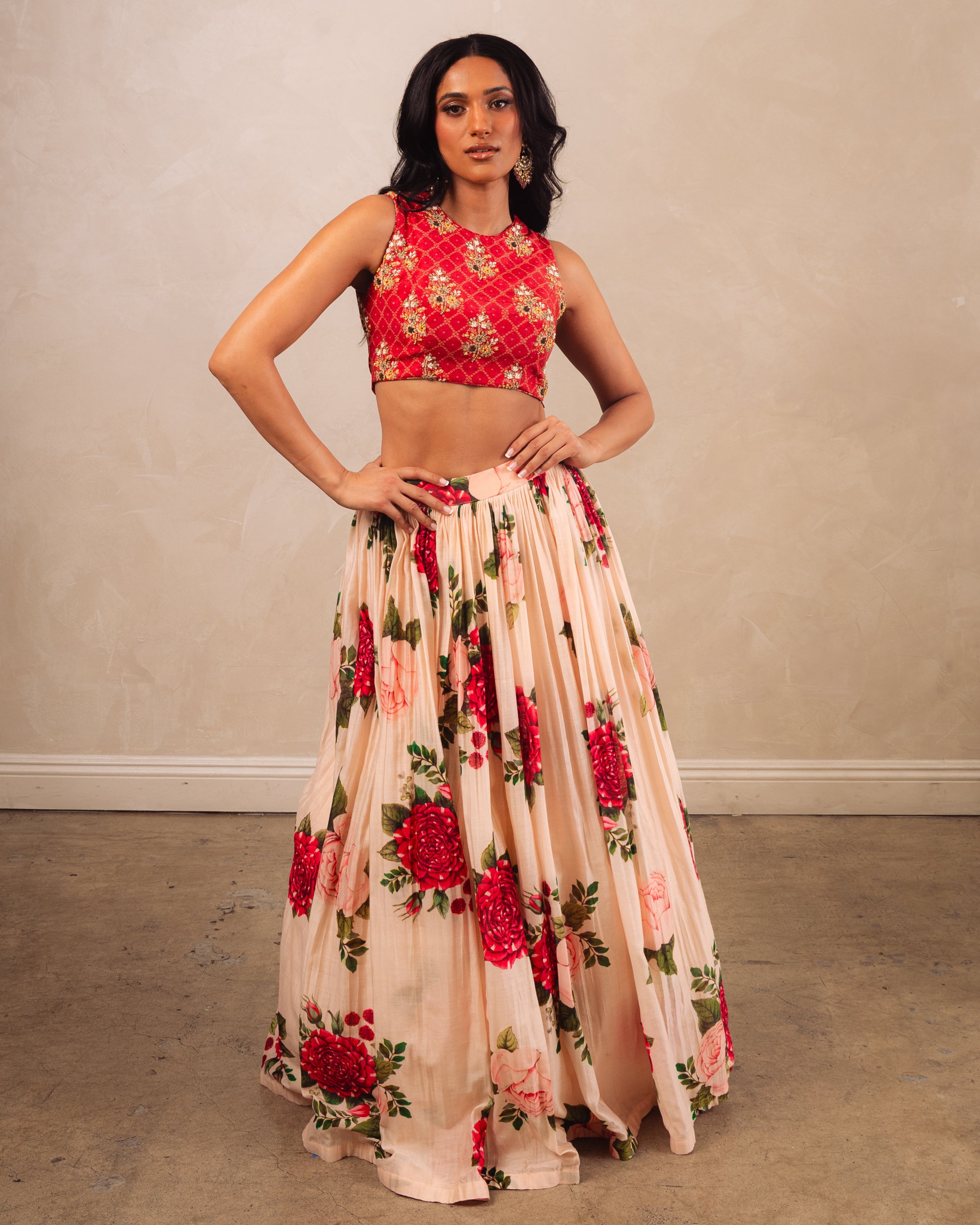 Red Printed Crop Top And A Peach Printed Skirt