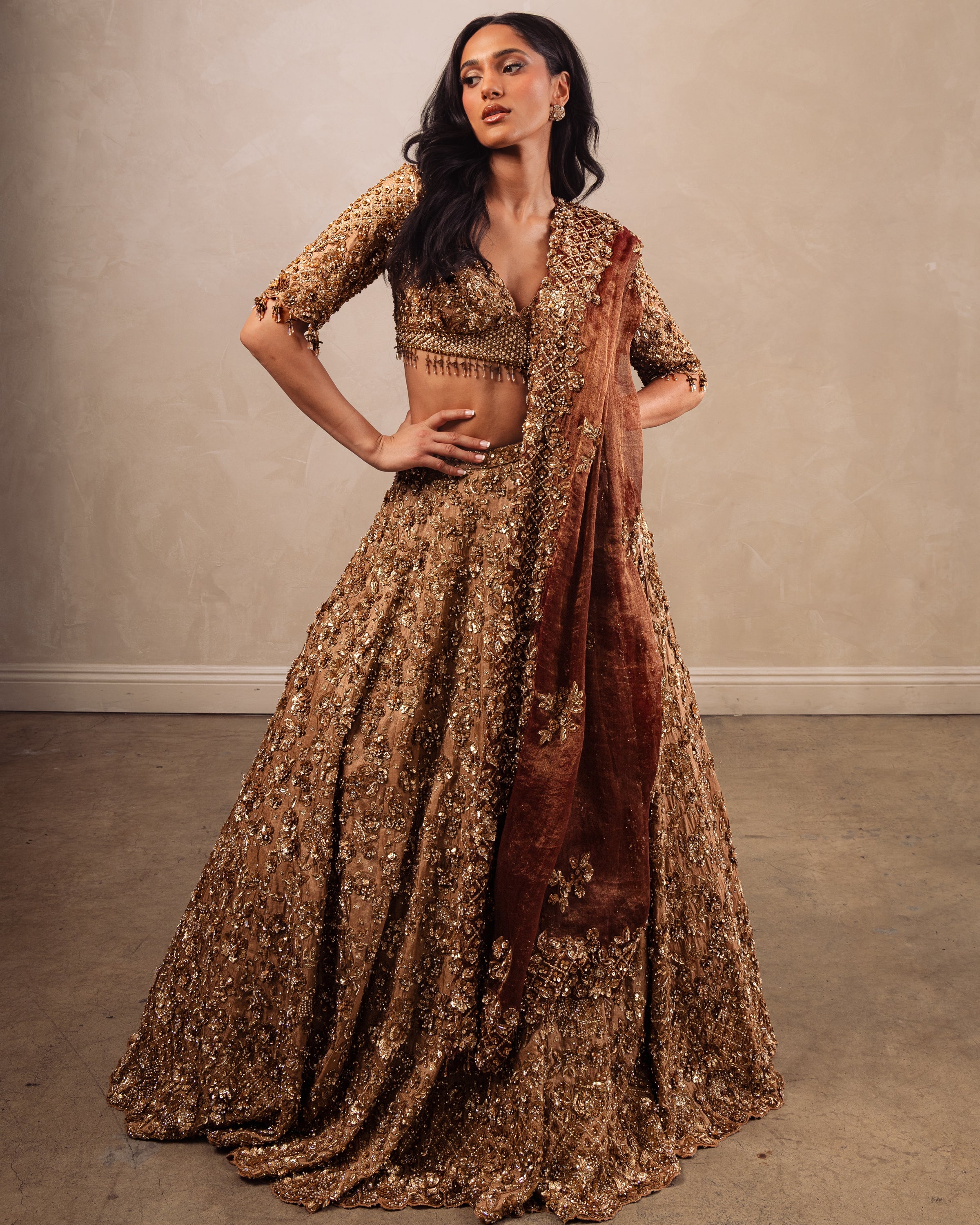 Gold Heavily Embroidered Lehenga Set With Rust Dupatta