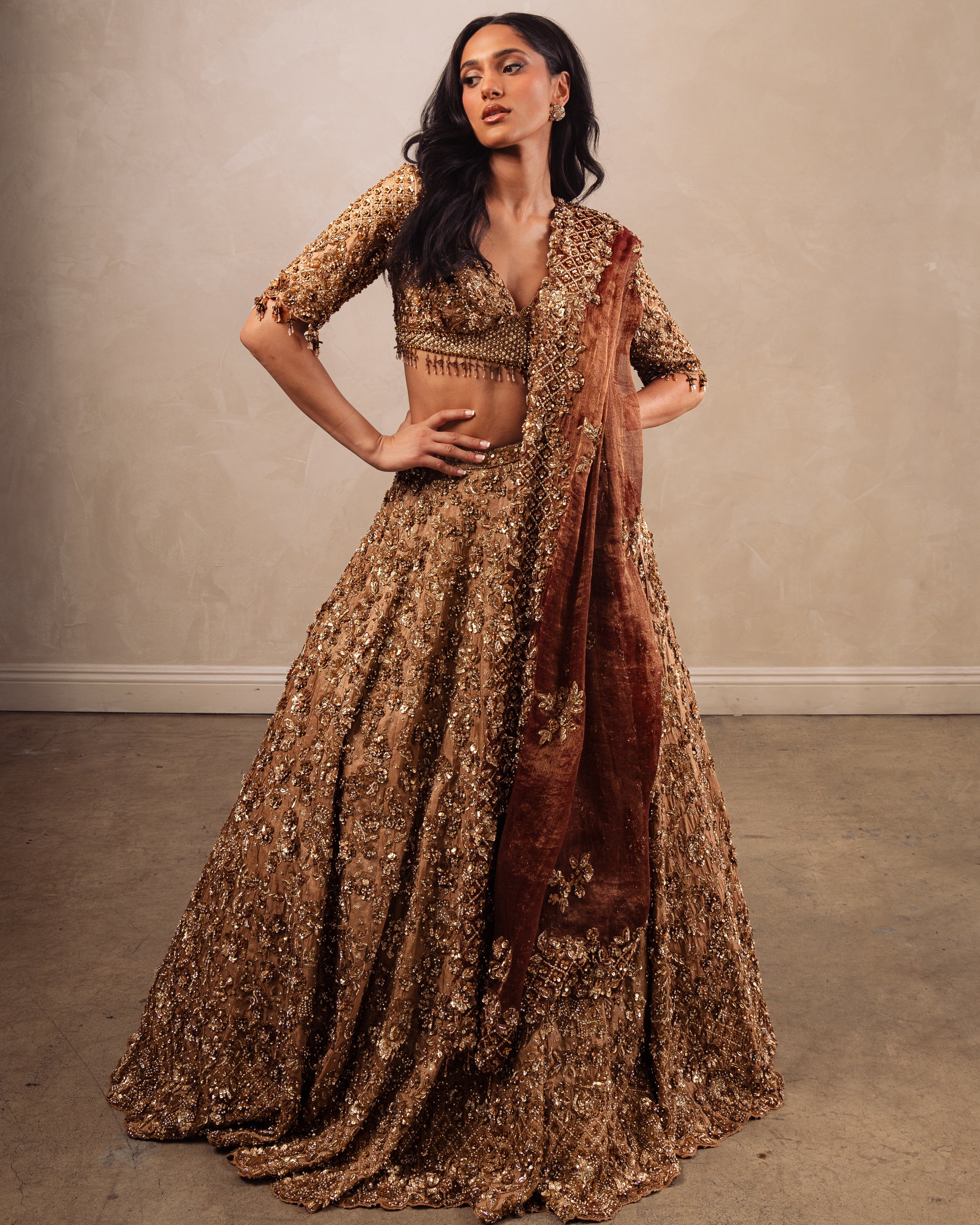 Gold Heavily Embroidered Lehenga Set With Rust Dupatta