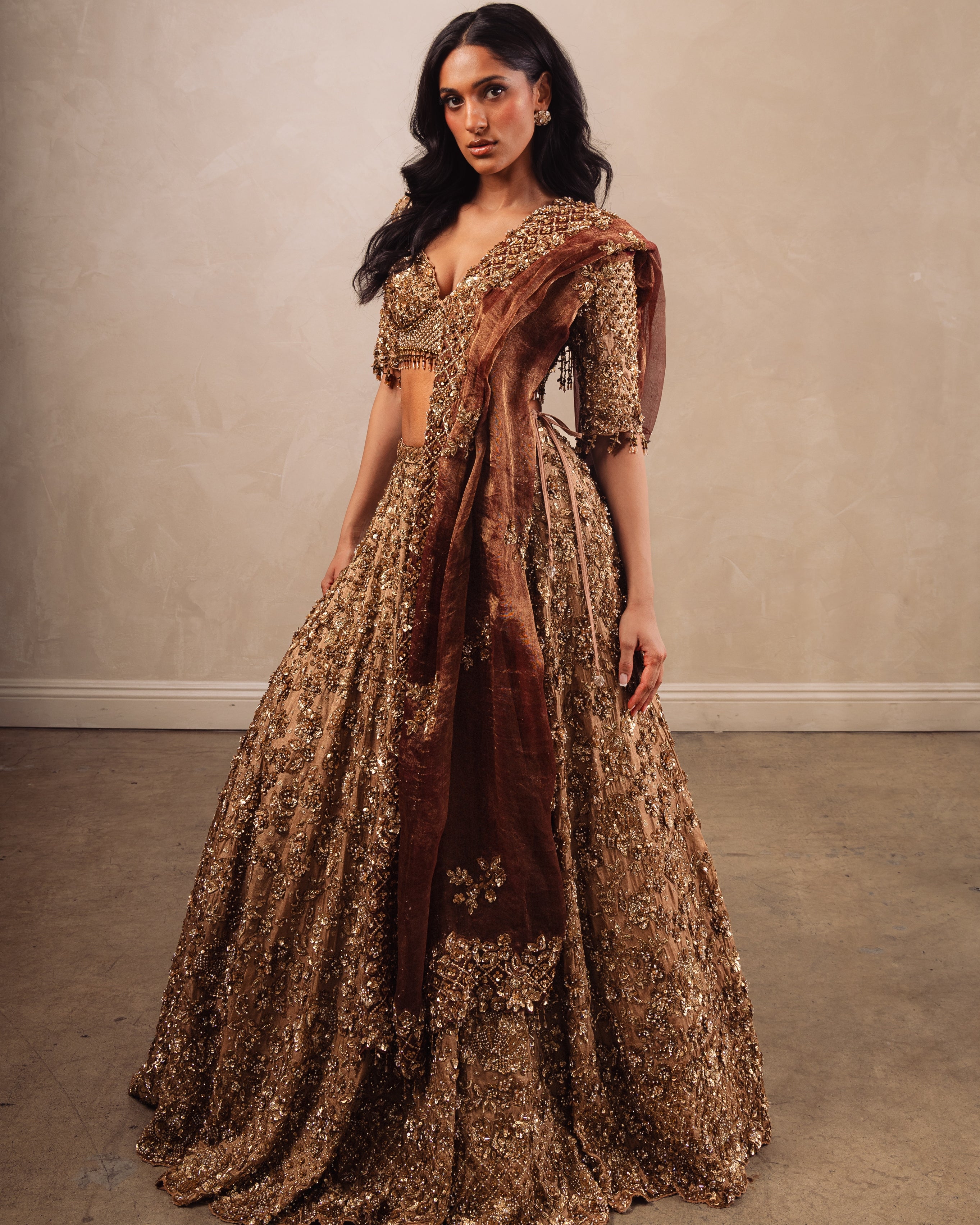 Gold Heavily Embroidered Lehenga Set With Rust Dupatta