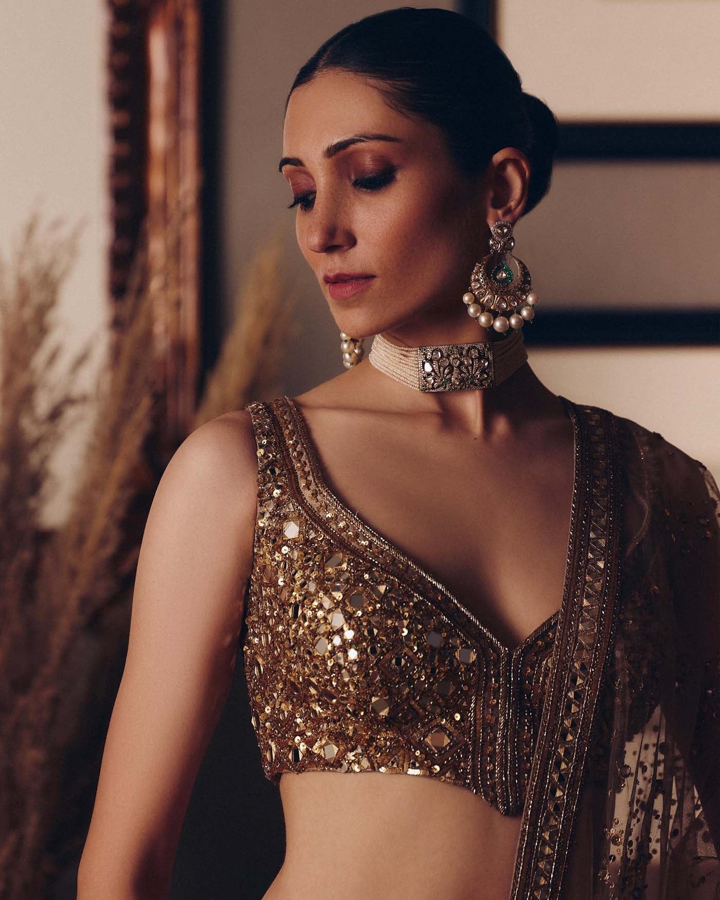 The Sheeshraag Toasted  Gold Lehenga