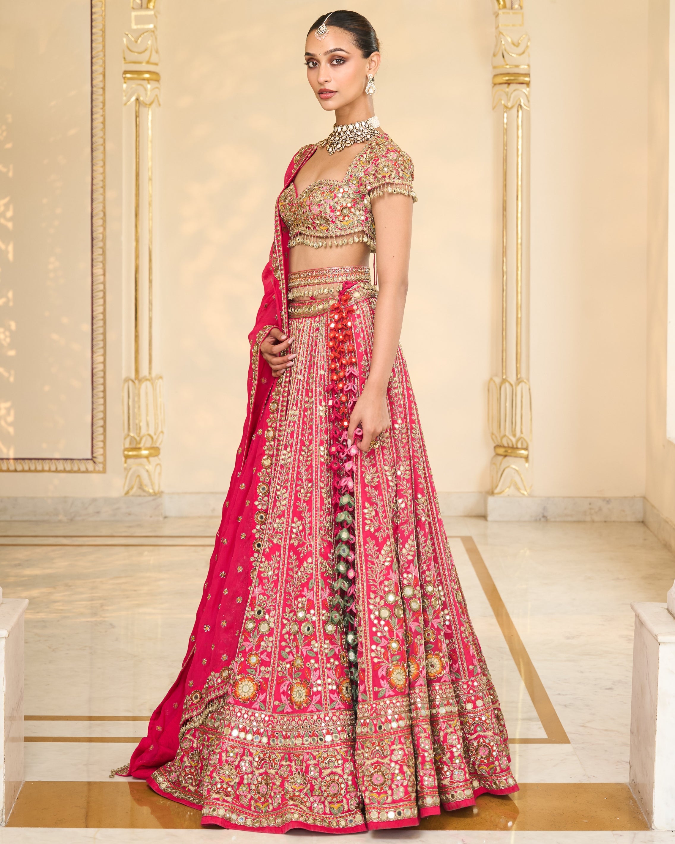 Rani Pink Organza Multicolour Thread And Mirror Hand Embroidered Lehenga Set