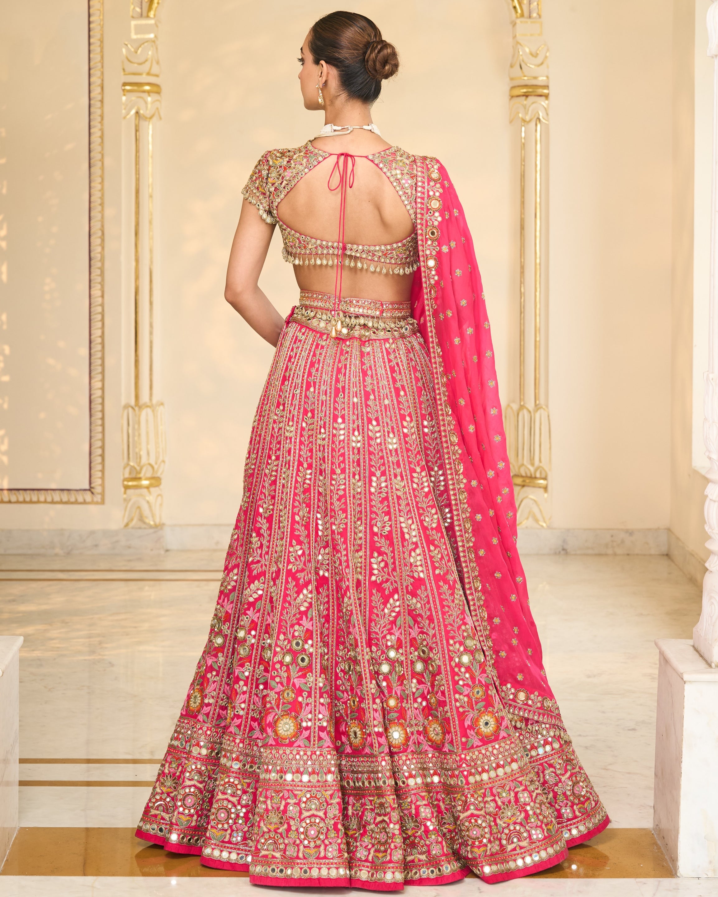 Rani Pink Organza Multicolour Thread And Mirror Hand Embroidered Lehenga Set