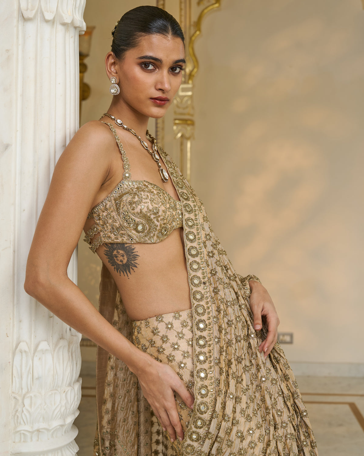 Gold Hand Embroidered Pre
 Stitched Tissue Lehenga
 Sari Set