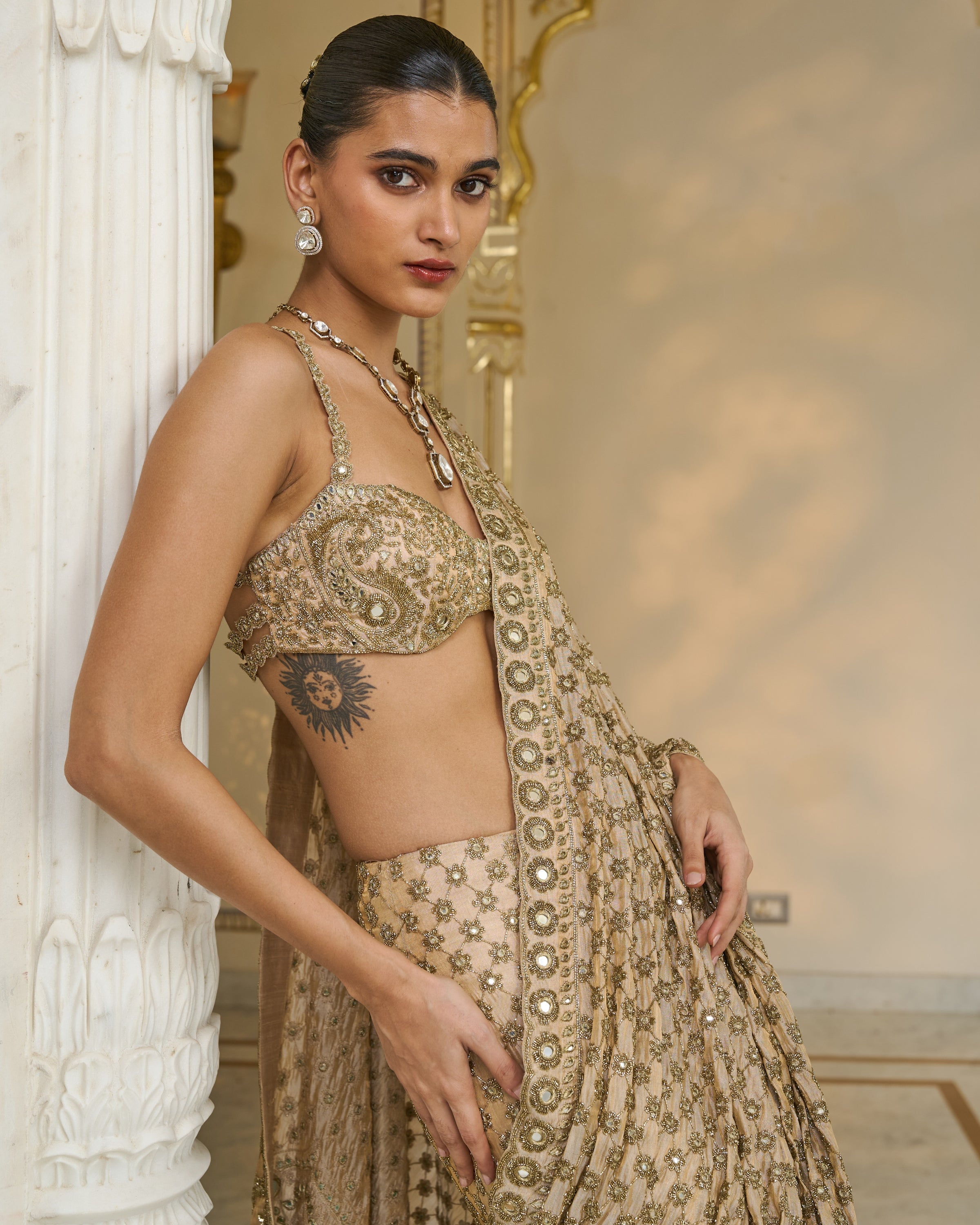 Gold Hand Embroidered Pre
 Stitched Tissue Lehenga
 Sari Set