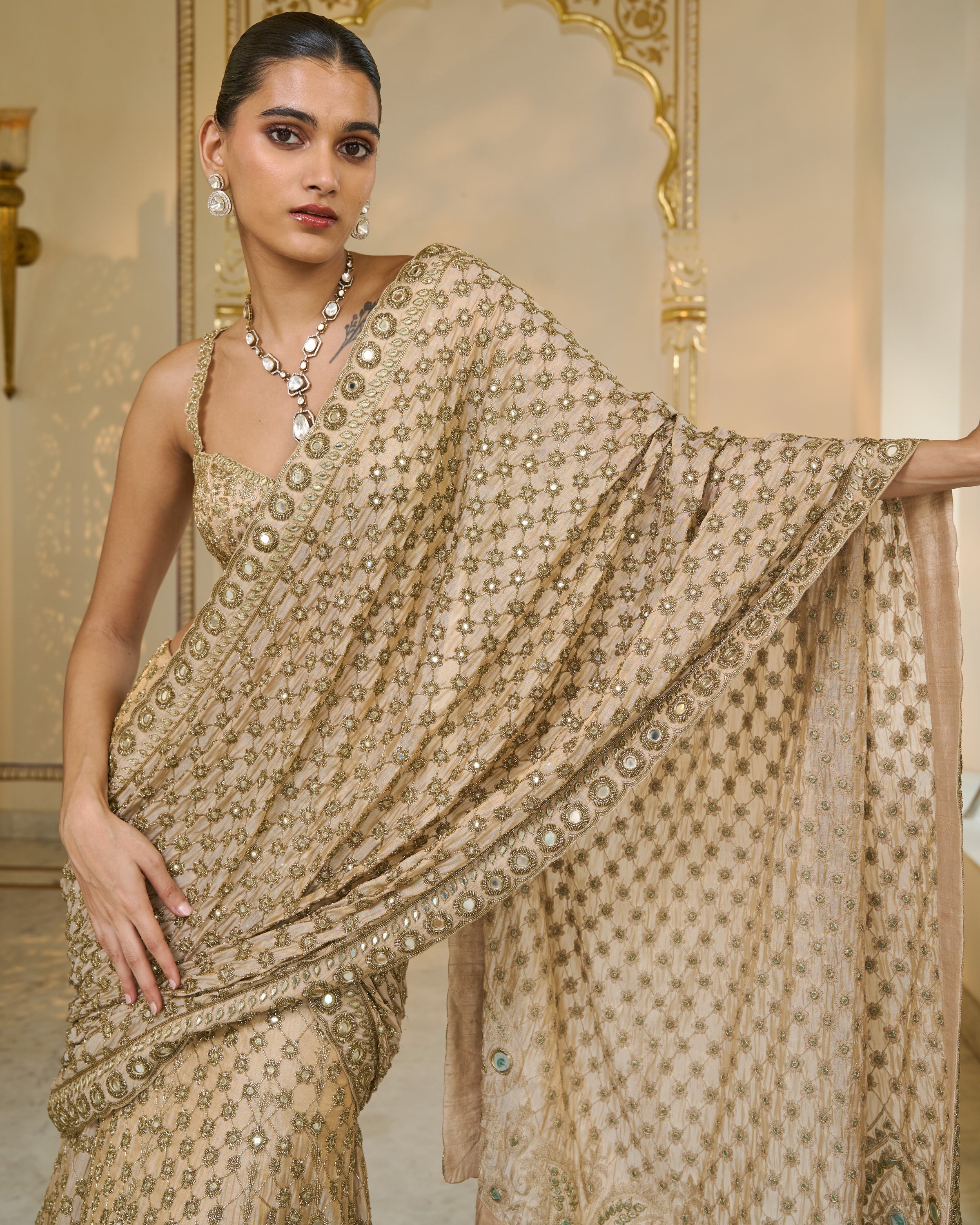 Gold Hand Embroidered Pre
 Stitched Tissue Lehenga
 Sari Set