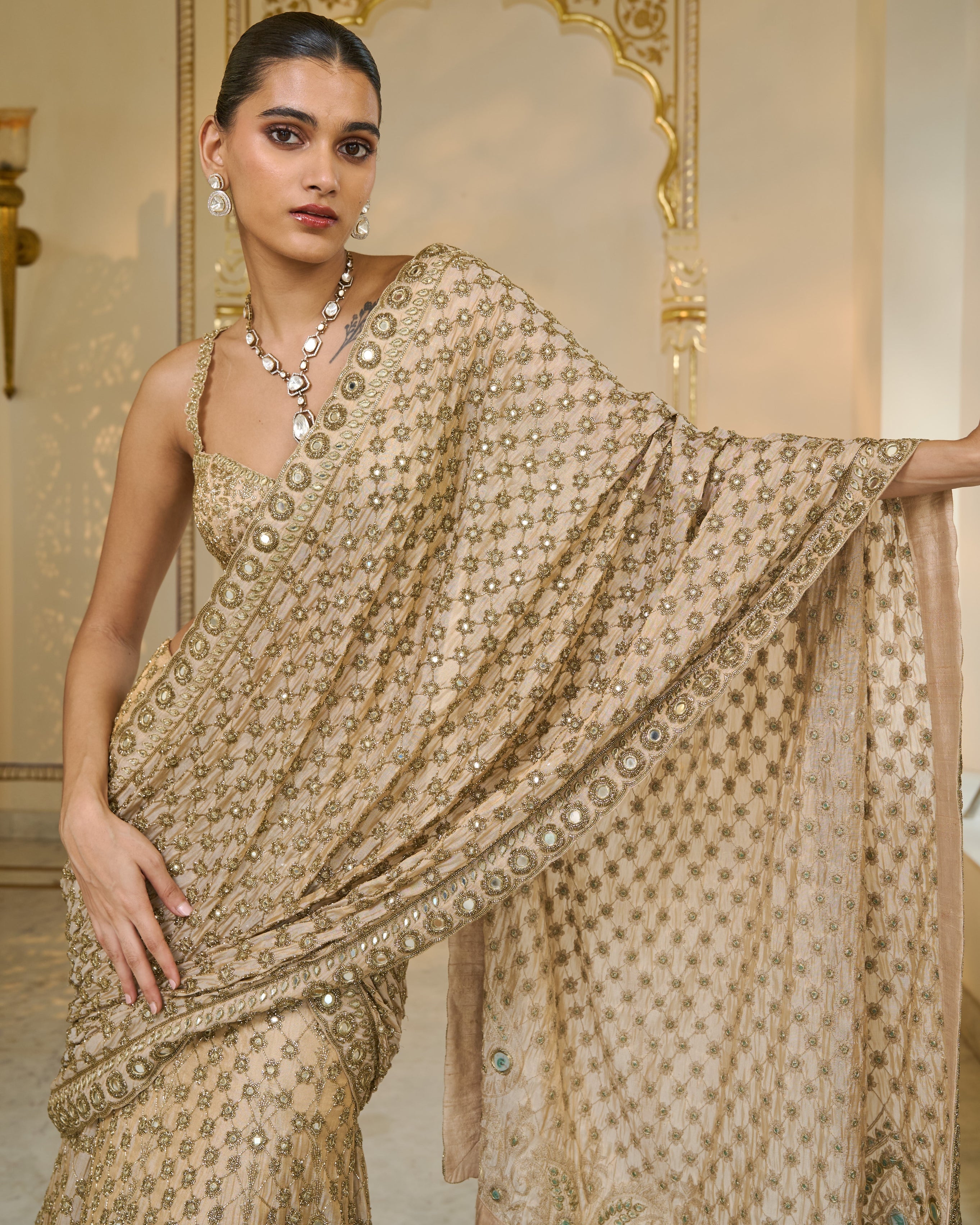 Gold Hand Embroidered Pre
 Stitched Tissue Lehenga
 Sari Set