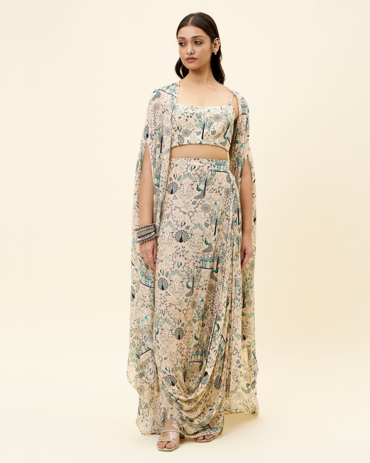 Beige Peacock Print Cape And Draped Skirt Set by SVA