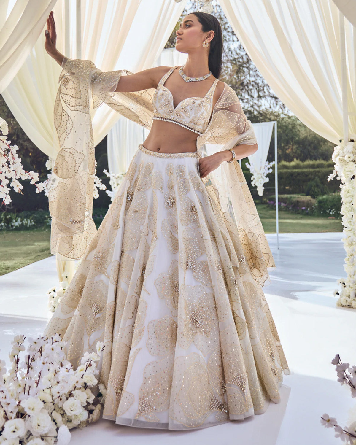 White and Gold Floral Lehenga by Seema Gujral at KYNAH