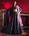 Navy Blue Full Printed Raw Silk Lehenga With Deep Neck Embroidered Blouse by Ridhi Mehra