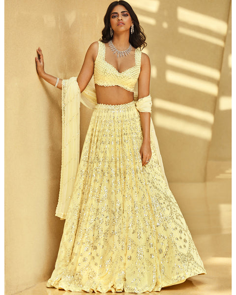 Buy Kiara lemon yellow lehenga with a blouse and dupatta.