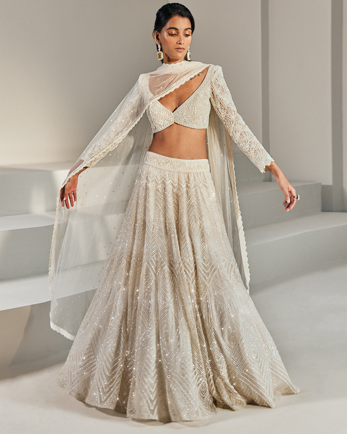 Geometric Embroidered White Lehenga Set by Ritika Mirchandani at KYNAH