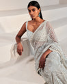Ivory All-Over Embroidered Cutwork Sari by Ritika Mirchandani at KYNAH